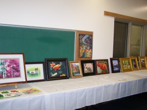 SRAG Open House 2011 - table displaying artwork 100_5346